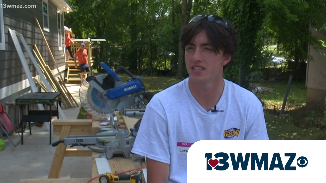 student interviewed on building site