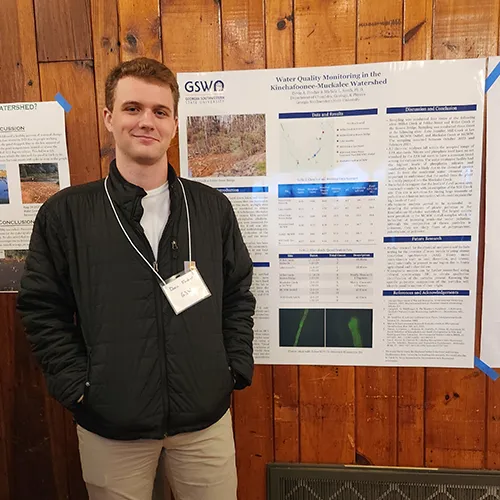 Devin Fincher with research poster